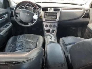 2009 Chrysler Sebring Limited with VIN 1C3LC56V89N563161, listed as a Copart auction lot 51049045 with 148,476 mi miles and Salvage Title. Bid and sale history available at DreamBid. Image 8.