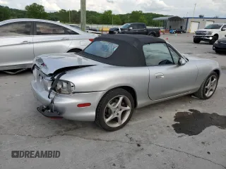 2001 Mazda MX-5 Miata z VIN JM1NB353510208400, wystawiony jako Copart lot #54516515 z przebiegiem 148 198 mil mil oraz Czysty tytuł • Clean title. Historia ofert i sprzedaży dostępna na DreamBid. Obrazek 3.