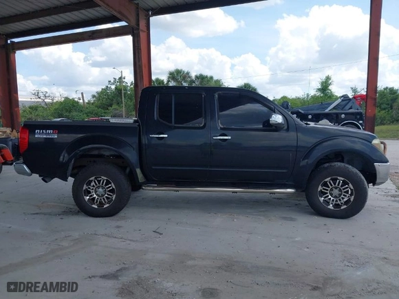 2005 Nissan Frontier 4WD SE with VIN 1N6AD07W55C458719, listed as a IAAI auction lot 41964083 with 189,814 mi miles. Bid and sale history available at carsss.com. Image 13.