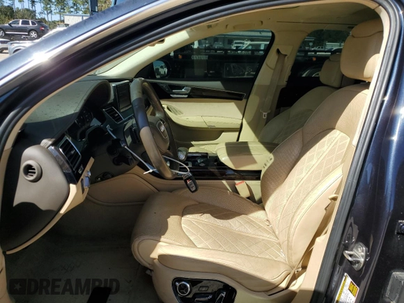 2016 Audi A8 L 4.0T Sport with VIN WAU43AFD2GN005588, listed as a Copart auction lot 76934794 with 133,813 mi miles and Salvage Title. Bid and sale history available at carsss.com. Image 7.