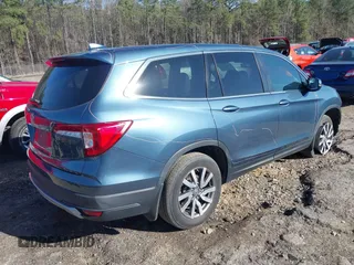 2021 Honda Pilot EX-L with VIN 5FNYF5H55MB031914, listed as a IAAI auction lot 41832882 with 30,630 mi miles. Bid and sale history available at carsss.com. Image 4.