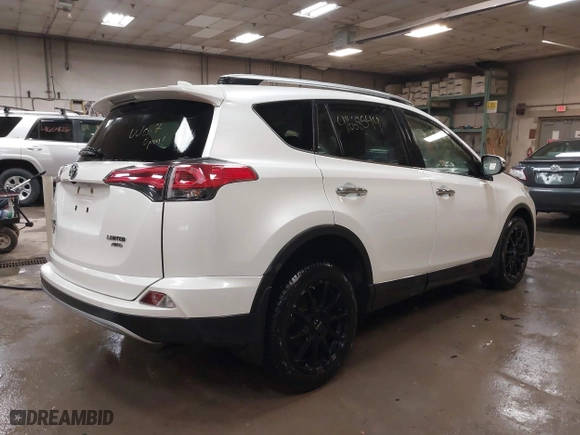 2018 Toyota RAV4 Limited with VIN JTMDFREV6JJ186499, listed as a IAAI auction lot 41668544 with 130,336 mi miles. Bid and sale history available at carsss.com. Image 4.