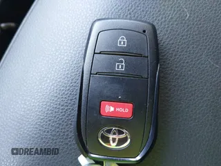 2025 Toyota Tacoma SR with VIN 3TMLB5JN7SM100983, listed as a IAAI auction lot 42220559 with 2,119 mi miles and . Bid and sale history available at DreamBid. Image 11.