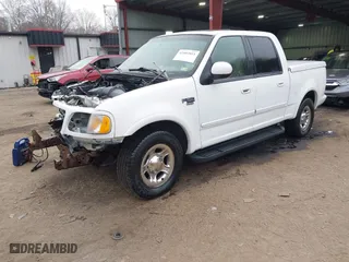 2001 Ford F-150 SuperCrew XLT with VIN 1FTRW07LX1KE14432, listed as a IAAI auction lot 41802811 with 192,696 mi miles. Bid and sale history available at carsss.com. Image 18.
