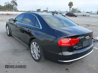 2013 Audi A8 3.0L with VIN WAURGAFD3DN005931, listed as a IAAI auction lot 42461062 with 113,899 mi miles and . Bid and sale history available at DreamBid. Image 3.