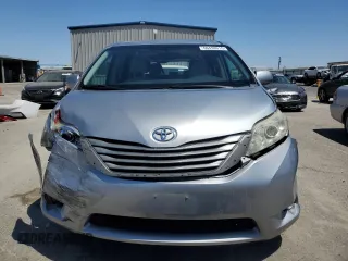 2014 Toyota Sienna XLE with VIN 5TDYK3DCXES496657, listed as a Copart auction lot 60498015 with 178,486 mi miles and Salvage title. Bid and sale history available at DreamBid. Image 5.