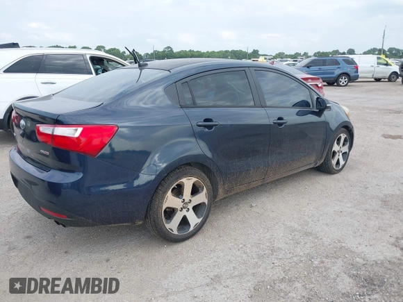 2013 Kia Rio EX with VIN KNADN4A39D6271075, listed as a IAAI auction lot 42684197 with 136,099 mi miles and . Bid and sale history available at DreamBid. Image 4.