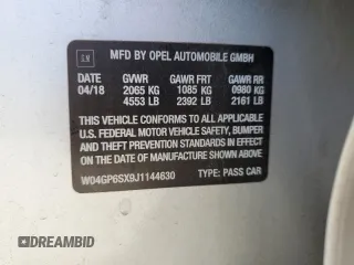 2018 Buick Regal Essence with VIN W04GP6SX9J1144630, listed as a Copart auction lot 53074585 with 96,077 mi miles and Salvage title. Bid and sale history available at DreamBid. Image 12.