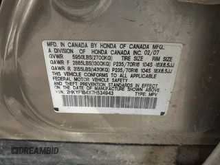 2007 Honda Pilot EX with VIN 2HKYF184X7H534943, listed as a IAAI auction lot 41818741 with 220,151 mi miles. Bid and sale history available at carsss.com. Image 9.