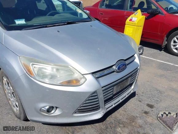 2012 Ford Focus SE with VIN 1FAHP3K28CL343856, listed as a IAAI auction lot 41990103 with 176,588 mi miles. Bid and sale history available at carsss.com. Image 6.