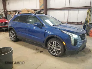 2023 Cadillac XT4 AWD Sport z VIN 1GYFZFR47PF153453, wystawiony jako Copart lot #56988695 z przebiegiem 67 533 mil mil oraz Szkody całkowita. Historia ofert i sprzedaży dostępna na DreamBid. Obrazek 4.
