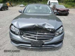 2018 Mercedes-Benz E 300 with VIN WDDZF4KBXJA337966, listed as a Copart auction lot 58718355 with 54,264 mi miles and Salvage title. Bid and sale history available at DreamBid. Image 5.
