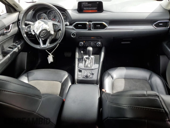 2018 Mazda CX-5 Touring z VIN JM3KFBCM2J0379190, wystawiony jako Copart lot #59233075 z przebiegiem 51 985 mil mil oraz Szkoda całkowita • Salvage title. Historia ofert i sprzedaży dostępna na DreamBid. Obrazek 8.