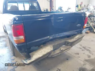 1997 Ford Ranger XLT with VIN 1FTCR10A7VUA22997, listed as a IAAI auction lot 42120989 with 231,765 mi miles. Bid and sale history available at carsss.com. Image 6.