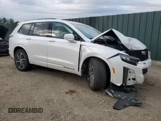 2022 Cadillac XT6 Sport with VIN 1GYKPGRS4NZ174846, listed as a Copart auction lot 64271474 with 57,891 mi miles and Salvage Title. Bid and sale history available at carsss.com. Image 4.