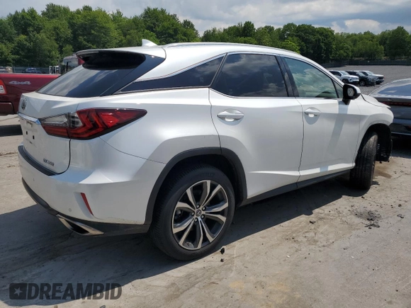 2019 Lexus RX 350 with VIN JTJBZMCA1K2041526, listed as a Copart auction lot 60991095 with 42,644 mi miles and Salvage title. Bid and sale history available at DreamBid. Image 3.