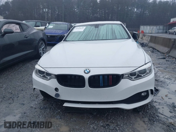 2014 BMW 4 Series 428i with VIN WBA3N7C52EF718794, listed as a IAAI auction lot 41416632 with 179,681 mi miles and . Bid and sale history available at carsss.com. Image 12.