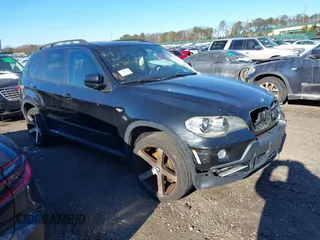 2008 BMW X5 3.0si with VIN 5UXFE43578L036366, listed as a IAAI auction lot 41181561 with 999,999 mi miles. Bid and sale history available at carsss.com. Image 1.