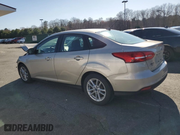 2018 Ford Focus SE with VIN 1FADP3F23JL219189, listed as a Copart auction lot 52209335 with 101,180 mi miles and Salvage title. Bid and sale history available at DreamBid. Image 2.