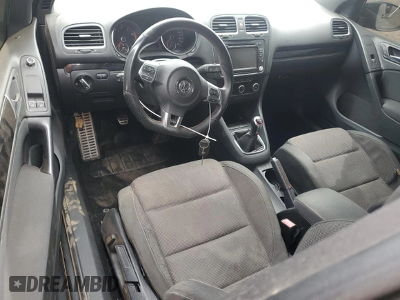 2013 Volkswagen GTI z VIN WVWEV7AJ2DW125334, wystawiony jako Copart lot #57248175 z przebiegiem Nie podano mil oraz Szkoda całkowita • Salvage title. Historia ofert i sprzedaży dostępna na DreamBid. Obrazek 8.