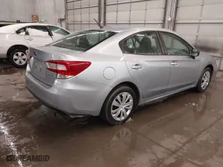 2019 Subaru Impreza with VIN 4S3GKAB63K3600089, listed as a IAAI auction lot 41849888 with 48,397 mi miles. Bid and sale history available at carsss.com. Image 4.