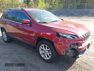 2014 Jeep Cherokee Latitude z VIN 1C4PJMCS5EW287159, wystawiony jako IAAI lot #42210599 z przebiegiem 111 945 mil mil oraz . Historia ofert i sprzedaży dostępna na DreamBid. Obrazek 1.