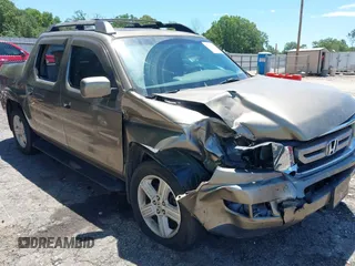 2011 Honda Ridgeline RTL with VIN 5FPYK1F57BB452321, listed as a IAAI auction lot 42306915 with Not provided miles and . Bid and sale history available at DreamBid. Image 6.