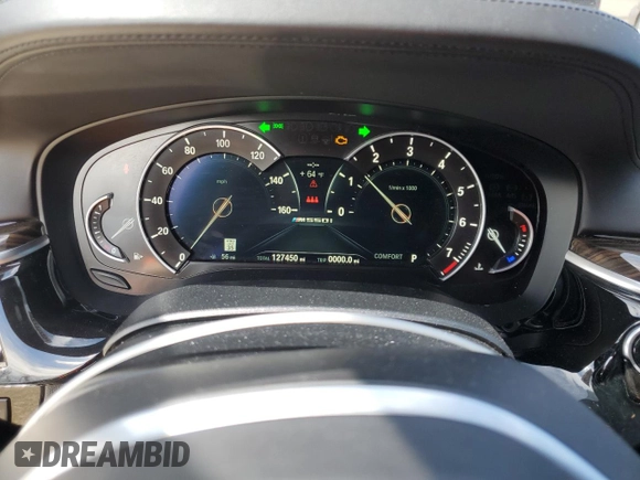 2018 BMW 5 Series M550i xDrive with VIN WBAJB9C57JB286734, listed as a Copart auction lot 52711235 with 127,450 mi miles and Salvage title. Bid and sale history available at DreamBid. Image 9.