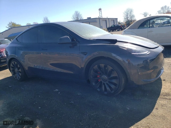 2024 Tesla Model Y Performance with VIN 7SAYGDEF2RA323192, listed as a Copart auction lot 49386595 with 5,044 mi miles and Salvage Title. Bid and sale history available at carsss.com. Image 4.