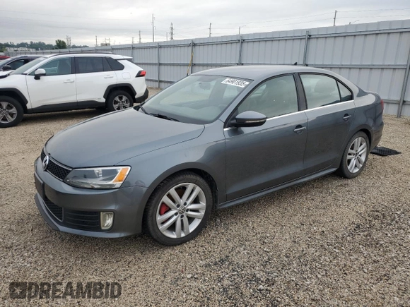 2014 Volkswagen Jetta GLI z VIN 3VW4T7AJ2EM245201, wystawiony jako Copart lot #64901935 z przebiegiem 147 799 mil mil oraz Czysty tytuł • Clean title. Historia ofert i sprzedaży dostępna na DreamBid. Obrazek 1.