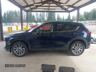 2019 Mazda CX-5 Grand Touring with VIN JM3KFBDM6K0522903, listed as a IAAI auction lot 42583005 with 61,174 mi miles and . Bid and sale history available at DreamBid. Image 15.