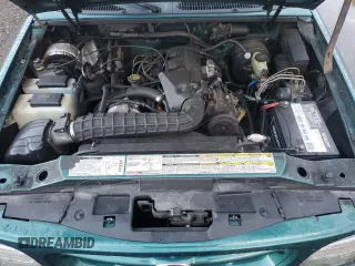 1998 Ford Explorer XL z VIN 1FMZU34X8WZB89467, wystawiony jako Copart lot #49973325 z przebiegiem 168 026 mil mil oraz Czysty tytuł • Clean title. Historia ofert i sprzedaży dostępna na DreamBid. Obrazek 12.
