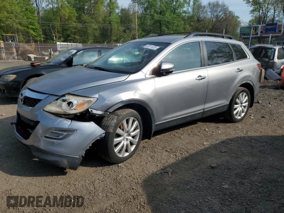 2010 Mazda CX-9 Grand Touring z VIN JM3TB3MA9A0220094, wystawiony jako Copart lot #53611025 z przebiegiem 163 870 mil mil oraz Szkoda całkowita • Salvage title. Historia ofert i sprzedaży dostępna na DreamBid. Obrazek 1.