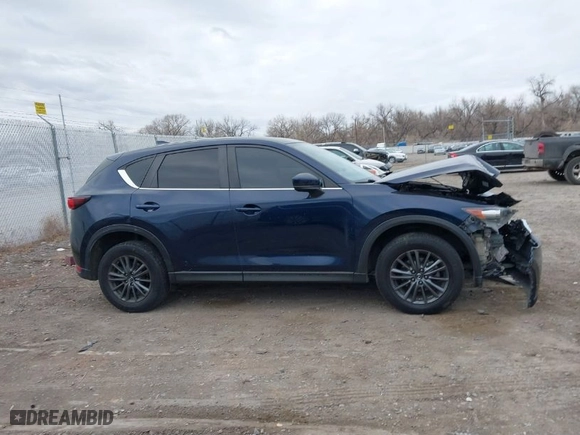 2019 Mazda CX-5 Touring with VIN JM3KFBCM4K0550054, listed as a IAAI auction lot 41071286 with NaN miles. Bid and sale history available at carsss.com. Image 13.