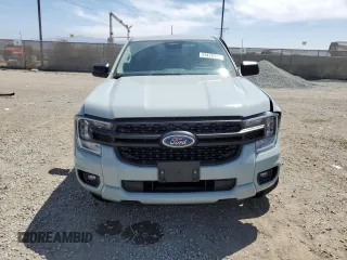2024 Ford Ranger XL with VIN 1FTER4PH3RLE21396, listed as a Copart auction lot 53475135 with 4,918 mi miles and Salvage Title. Bid and sale history available at carsss.com. Image 5.