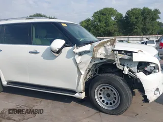 2014 Infiniti QX80 z VIN JN8AZ2NE6E9063136, wystawiony jako IAAI lot #42233348 z przebiegiem 145 988 mil mil oraz . Historia ofert i sprzedaży dostępna na DreamBid. Obrazek 17.