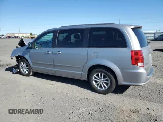 2014 Dodge Grand Caravan SXT with VIN 2C4RDGCG4ER478657, listed as a Copart auction lot 55691085 with 139,681 mi miles and Salvage Title. Bid and sale history available at DreamBid. Image 2.