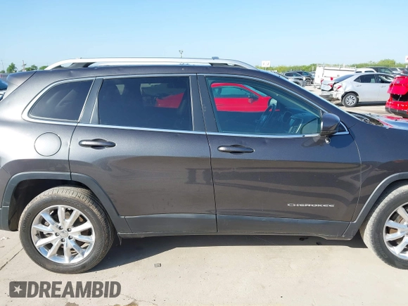 2016 Jeep Cherokee Limited with VIN 1C4PJLDS7GW159825, listed as a IAAI auction lot 41951609 with 102,624 mi miles and . Bid and sale history available at DreamBid. Image 13.
