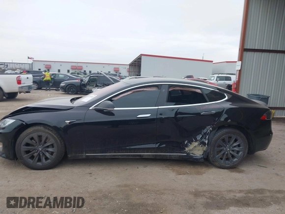 2018 Tesla Model S 75D with VIN 5YJSA1E22JF282828, listed as a IAAI auction lot 41595543 with 72,571 mi miles and . Bid and sale history available at DreamBid. Image 13.