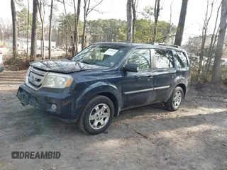 2009 Honda Pilot Touring with VIN 5FNYF48939B007471, listed as a IAAI auction lot 41683495 with 189,806 mi miles and . Bid and sale history available at carsss.com. Image 17.