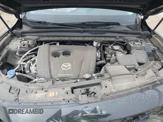 2024 Mazda CX-50 S Premium with VIN 7MMVABDM9RN155593, listed as a IAAI auction lot 41784433 with 20,549 mi miles and . Bid and sale history available at DreamBid. Image 10.