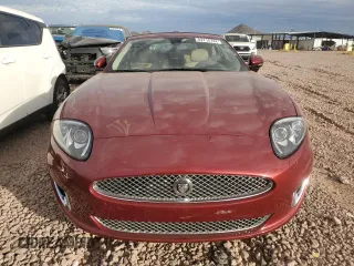 2013 Jaguar XK with VIN SAJWA4GB0DLB50530, listed as a Copart auction lot 82715724 with 24,634 mi miles and Salvage Title. Bid and sale history available at carsss.com. Image 5.