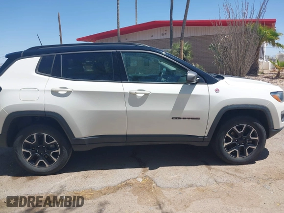 2019 Jeep Compass Trailhawk with VIN 3C4NJDDB4KT780239, listed as a IAAI auction lot 42095643 with 68,995 mi miles and . Bid and sale history available at DreamBid. Image 12.
