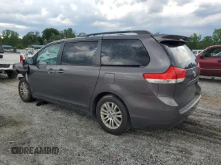 2012 Toyota Sienna XLE AAS with VIN 5TDYK3DC0CS251735, listed as a Copart auction lot 62208805 with 217,504 mi miles and Clean title. Bid and sale history available at DreamBid. Image 2.