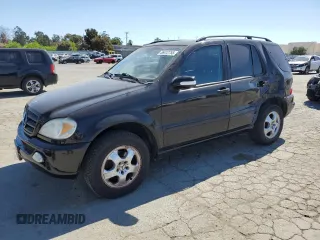 2004 Mercedes-Benz M 350 with VIN 4JGAB57E74A495306, listed as a Copart auction lot 56412755 with 158,159 mi miles and Salvage title. Bid and sale history available at DreamBid. Image 1.
