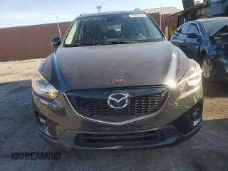 2014 Mazda CX-5 Grand Touring with VIN JM3KE4DY1E0328852, listed as a Copart auction lot 53965265 with 67,242 mi miles and Salvage Title. Bid and sale history available at DreamBid. Image 5.