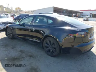 2023 Tesla Model S with VIN 5YJSA1E54PF531021, listed as a IAAI auction lot 42014104 with Not provided miles and . Bid and sale history available at DreamBid. Image 3.