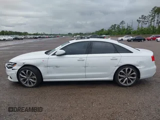 2013 Audi A6 Prestige with VIN WAUHGAFC2DN153202, listed as a IAAI auction lot 42242052 with 163,295 mi miles and . Bid and sale history available at DreamBid. Image 14.