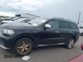 2014 Dodge Durango Citadel with VIN 1C4SDJET5EC314304, listed as a IAAI auction lot 42682540 with 213,651 mi miles and . Bid and sale history available at DreamBid. Image 14.