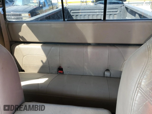 1999 Ford F-250 XL with VIN 1FTNX21SXXEE40026, listed as a Copart auction lot 69888634 with 215,535 mi miles and Salvage title. Bid and sale history available at DreamBid. Image 10.